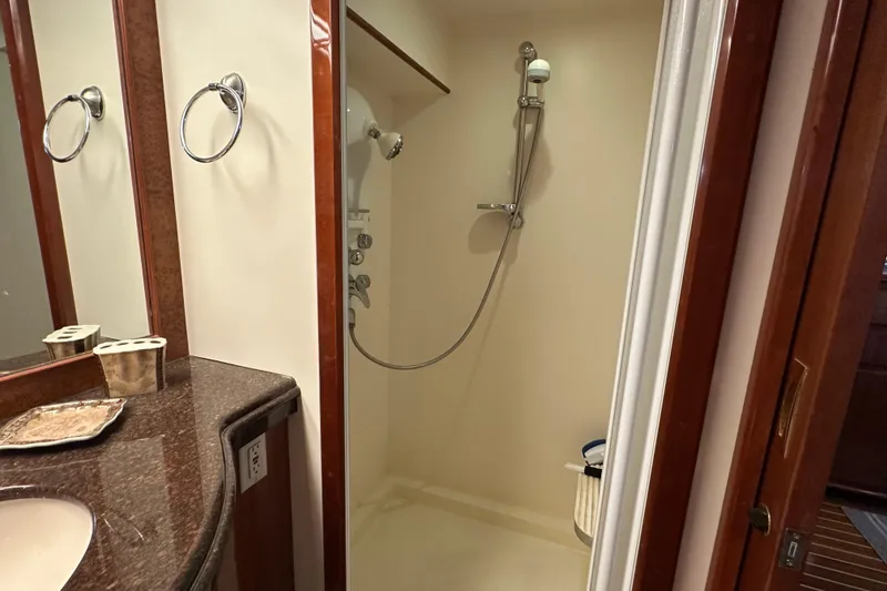 Slide: The Image of Luxurious bathroom in 2006 Novatec Islander 55 yacht with shower and vanity. - 80