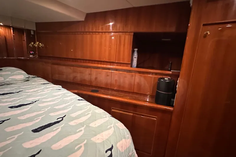 Slide: The Image of Luxurious cabin interior of 2006 Novatec Islander 55 yacht with wooden cabinetry. - 91
