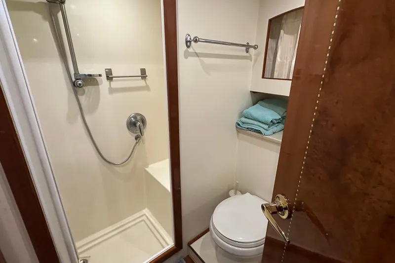 Slide: The Image of Bathroom interior of 2006 Novatec Islander 55 yacht, featuring shower and toilet. - 93