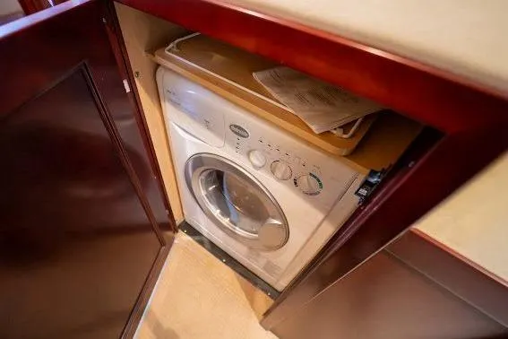 Slide: The Image of Built-in washing machine on 2006 Sea Ray 580 Sedan Bridge yacht. - 39