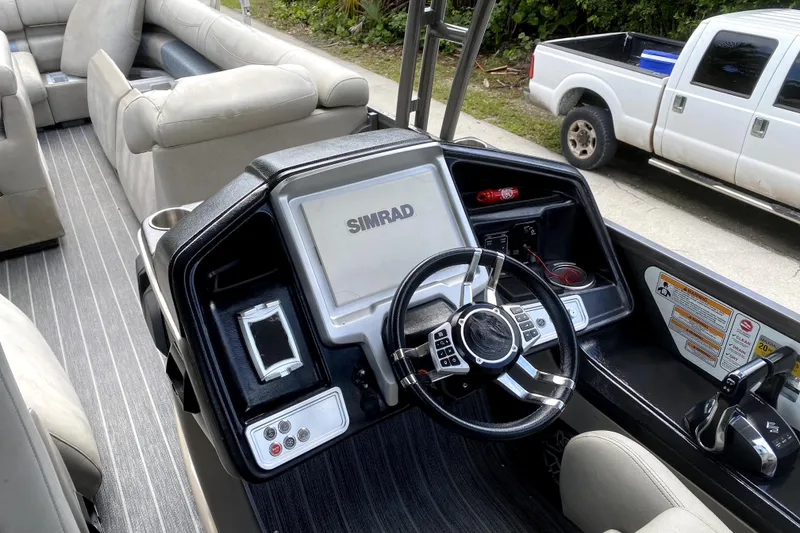 Slide: The Image of 2022 Premier Escalante boat deck with "Bougie Bum" storage compartment. - 10