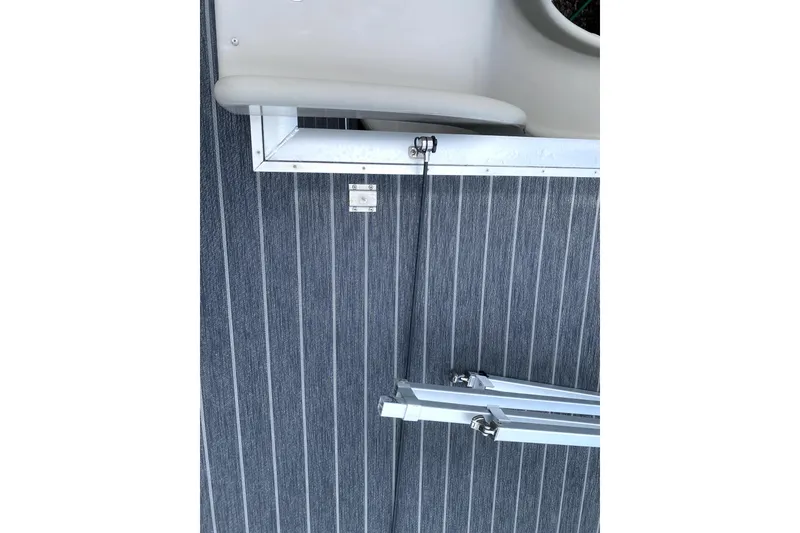 Slide: The Image of 2022 Premier Escalante boat seating with gray upholstery and diamond pattern accents. - 14