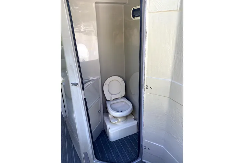 Slide: The Image of 2022 Premier Escalante boat slide, gray surface, outdoor setting, top view. - 24