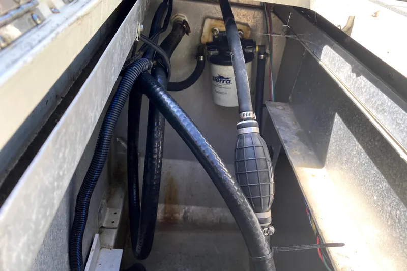 Slide: The Image of Top view of 2022 Premier Escalante boat with dual outboard motors. - 25