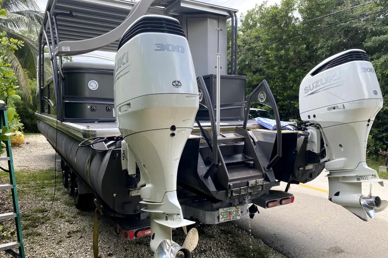 Slide: The Image of Luxurious seating in 2022 Premier Escalante boat, featuring elegant gray upholstery. - 26