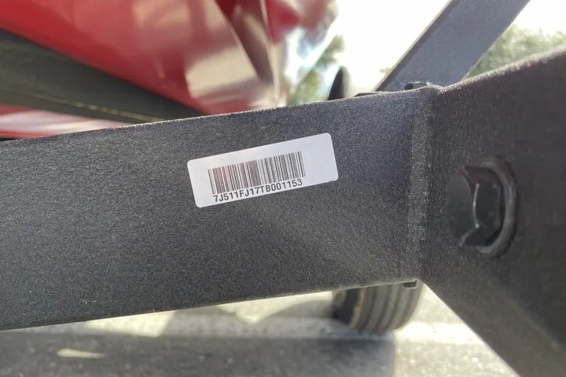 Slide: The Image of Barcode on 2026 Tracker Pro Team 190 boat trailer frame, close-up view. - 75