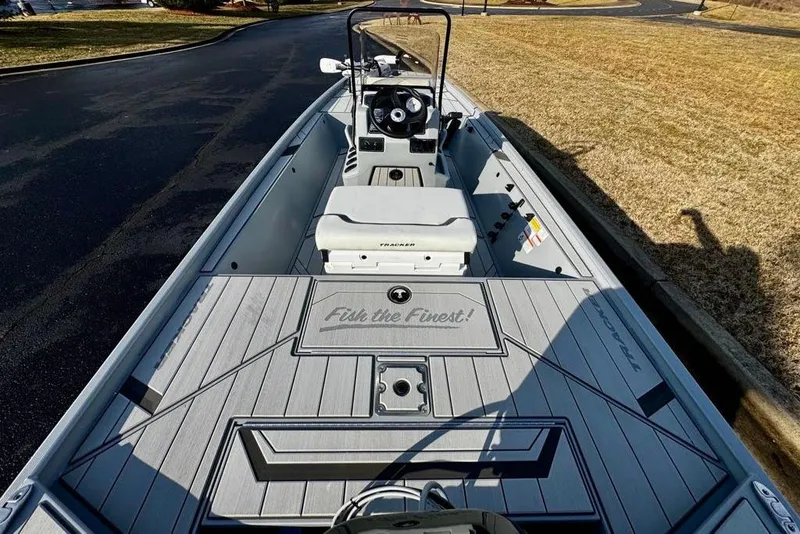 Slide: The Image of 2026 Tracker Bass Tracker Classic CC boat with "Fish the Finest!" deck design. - 6