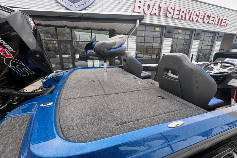 Slide: The Image of 2026 Nitro Z20 XL boat at service center, featuring spacious deck and modern seating. - 82