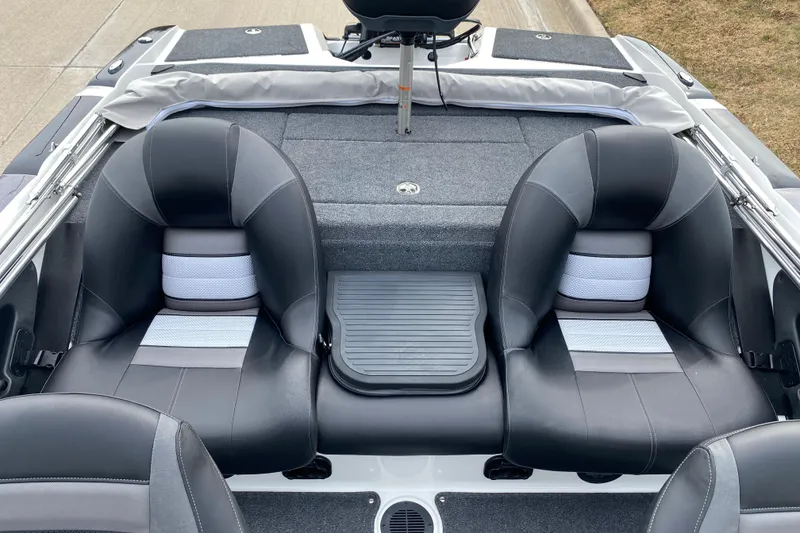 Slide: The Image of 2026 Ranger 212LS boat interior with dual black and gray seats, modern design. - 12