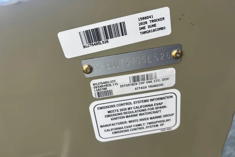 Slide: The Image of 2026 Tracker Targa V-18 Combo boat identification and emissions control labels. - 80