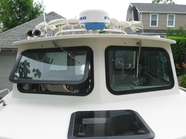 Slide: The Image of Parker Marine 2520 Deep Vee Sport Cabin 1999 - 5