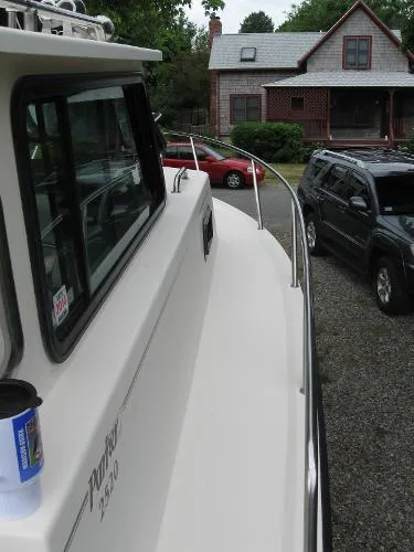 Slide: The Image of Parker Marine 2520 Deep Vee Sport Cabin 1999 - 7