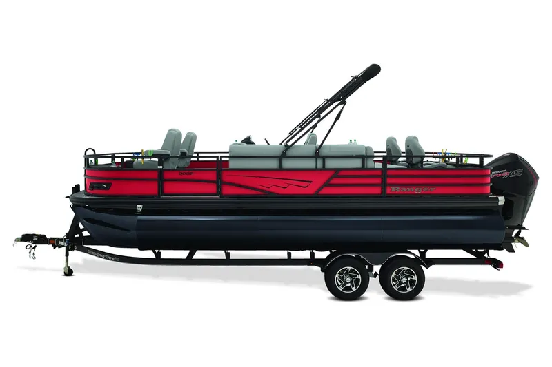 Slide: The Image of 2026 Ranger 223F boat rear view with motor, parked on a paved road. - 4