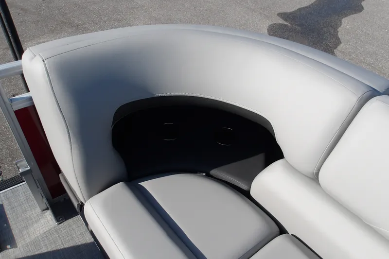 Slide: The Image of 2026 Sun Tracker SportFish 22 DLX boat seating, featuring sleek gray upholstery. - 23