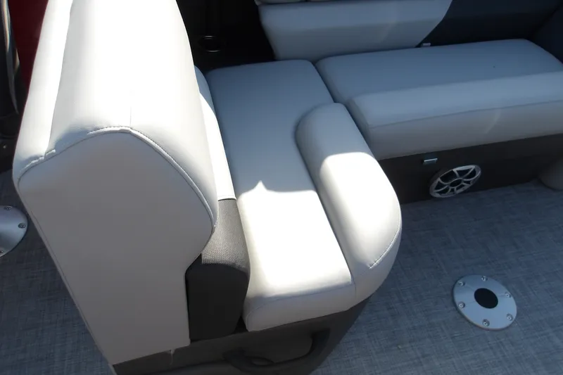 Slide: The Image of Luxurious seating on 2026 Sun Tracker SportFish 22 DLX boat, featuring premium upholstery and speaker system. - 15