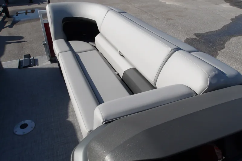 Slide: The Image of 2026 Sun Tracker SportFish 22 DLX boat interior with sleek gray seating. - 19