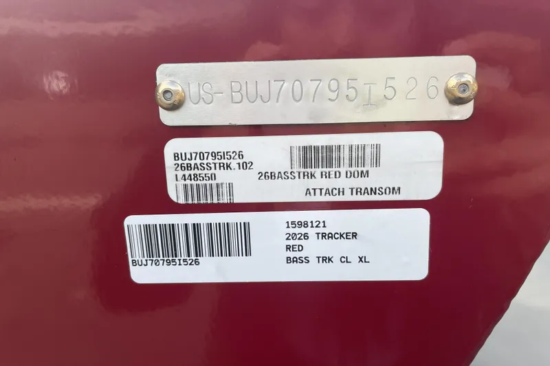 Slide: The Image of 2026 Tracker Bass Tracker Classic XL identification labels on red surface. - 69