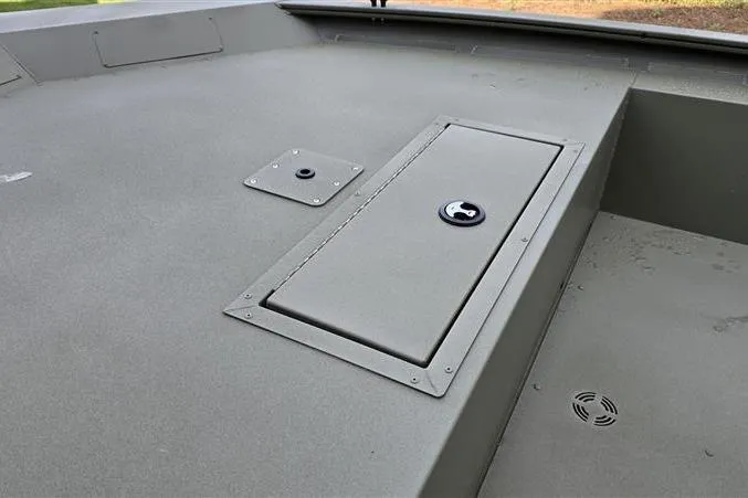 Slide: The Image of 2026 Tracker Grizzly 1754 Utility boat deck with storage compartment. - 4