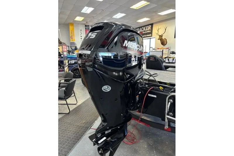 Slide: The Image of 2026 Ranger RT178C boat with Mercury 115 outboard motor in showroom. - 10