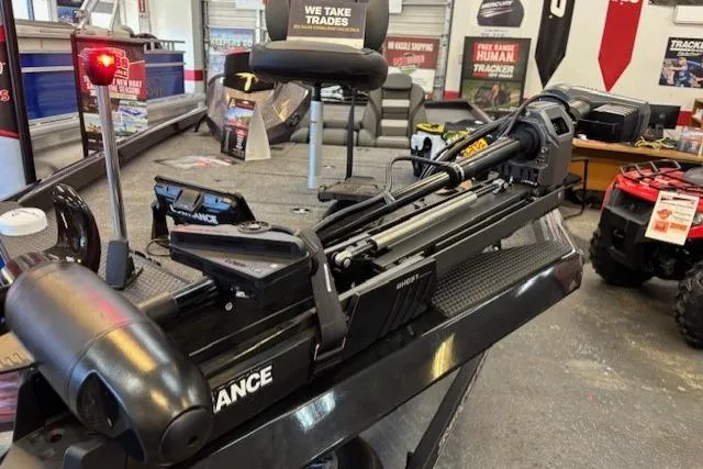 Slide: The Image of 2026 Ranger RT178C boat with advanced trolling motor and navigation equipment in showroom. - 3