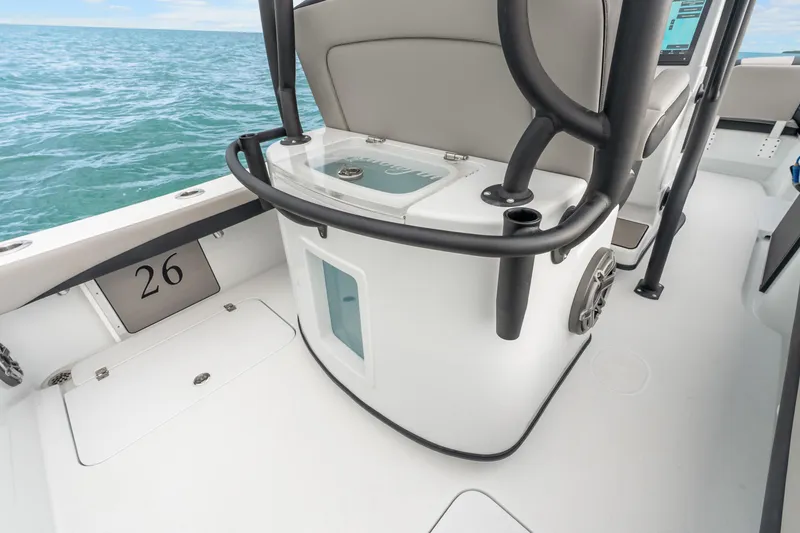 Slide: The Image of 2025 Yellowfin 26 Hybrid boat interior with seating and ocean view. - 29