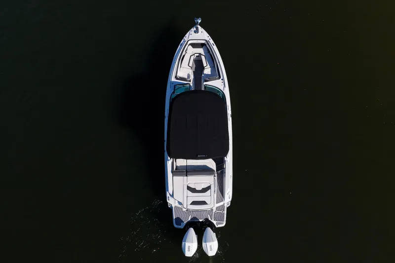 Slide: The Image of Aerial view of 2023 Monterey 305SS Super Sport boat on dark water. - 39