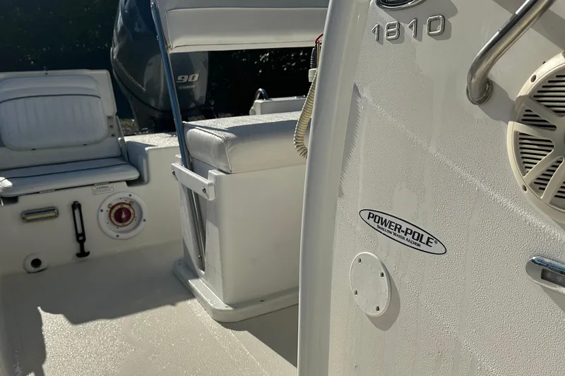 Slide: The Image of 2014 Nautistar 1810 CC boat interior with Power-Pole anchor and Yamaha engine. - 11