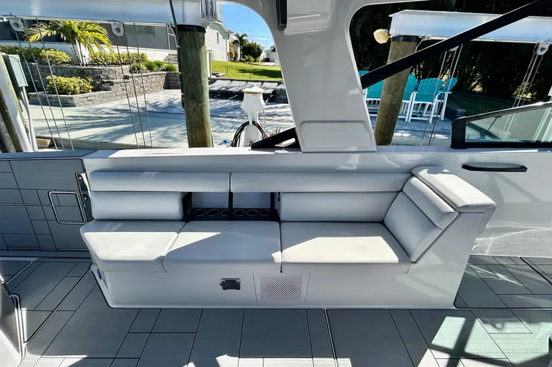 Slide: The Image of 2022 Aviara AV40 OB boat interior with sleek seating and modern design. - 18