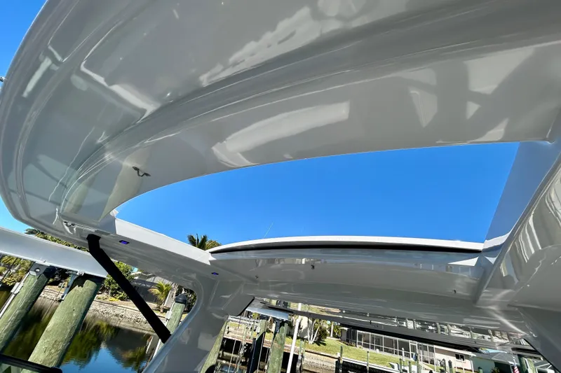 Slide: The Image of 2022 Aviara AV40 OB boat roof detail with clear blue sky background. - 27