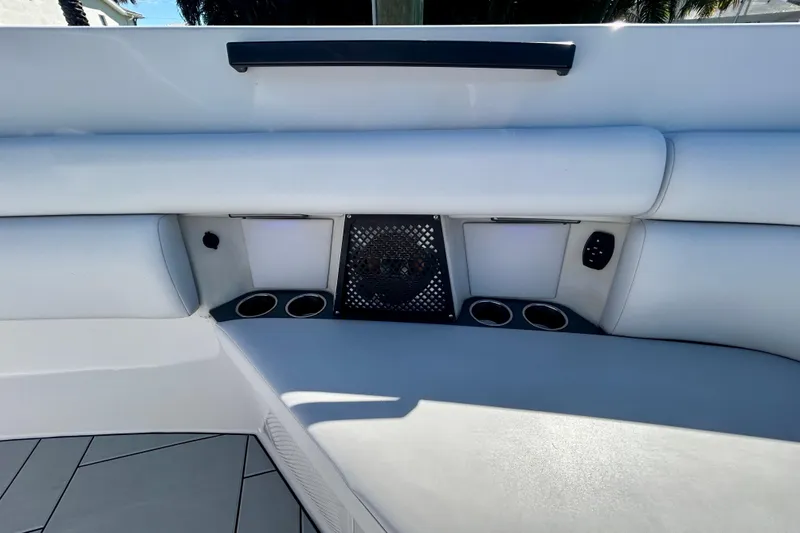 Slide: The Image of Luxurious seating area on 2022 Aviara AV40 OB boat with cup holders and speaker. - 40