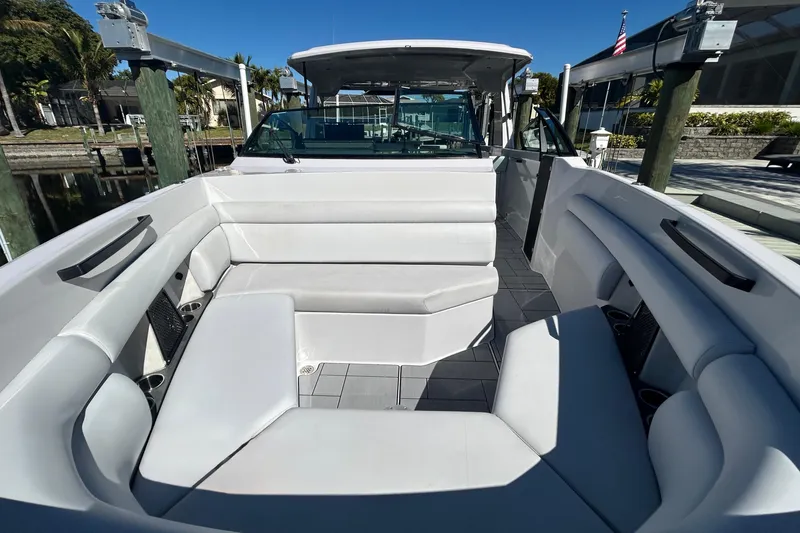 Slide: The Image of 2022 Aviara AV40 OB boat with spacious white seating and sleek design. - 41