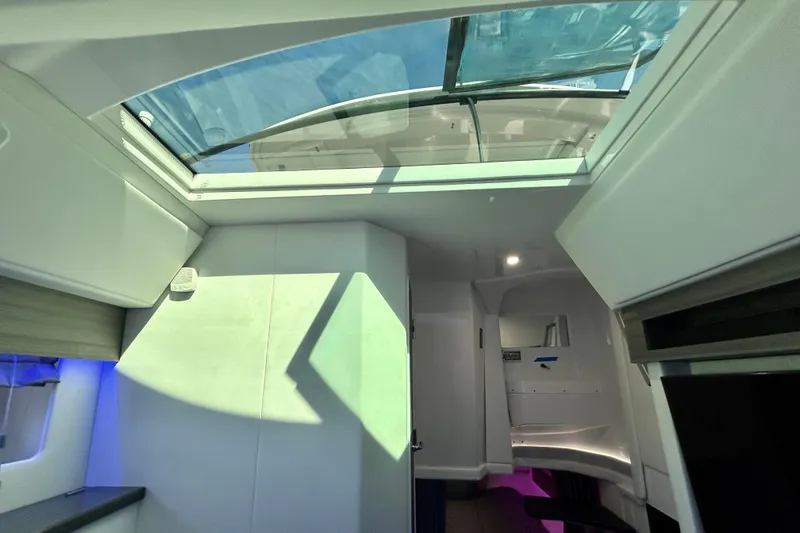 Slide: The Image of Interior view of 2022 Aviara AV40 OB boat with skylight and modern design. - 53