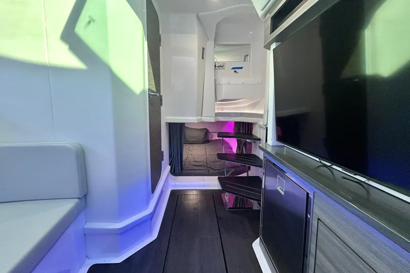 Slide: The Image of Interior of 2022 Aviara AV40 OB boat with modern design and ambient lighting. - 54