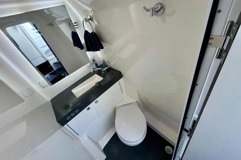 Slide: The Image of Luxurious 2022 Aviara AV40 OB boat bathroom with modern fixtures and sleek design. - 56