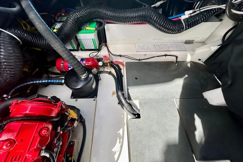 Slide: The Image of Engine compartment of 2022 Aviara AV40 OB boat, showing wiring and components. - 61