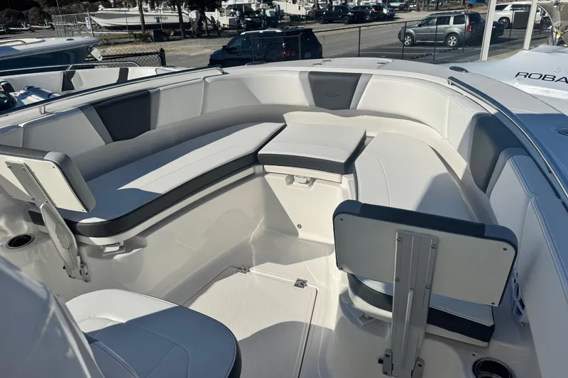 Slide: The Image of 2026 Robalo R250 Center Console boat interior with sleek seating and modern design. - 8