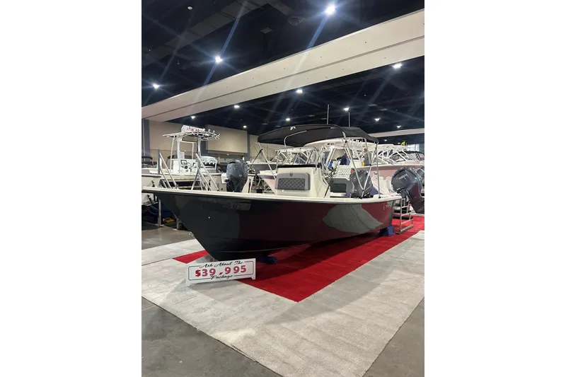 The Image of 2026 May-Craft 182 CC boat displayed indoors, priced at $39,995. - 0