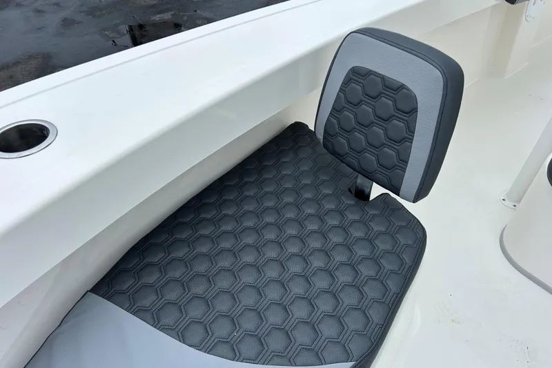 Slide: The Image of 2026 May-Craft 245 Offshore CC boat seat with hexagonal pattern upholstery. - 17