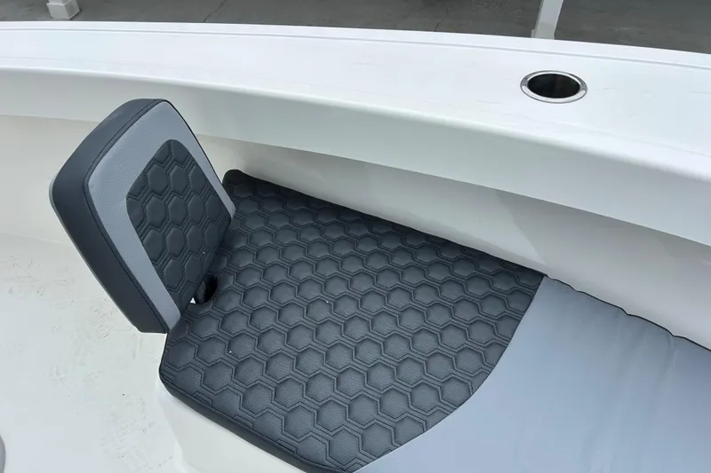 Slide: The Image of 2026 May-Craft 245 Offshore CC boat seat with hexagonal pattern upholstery. - 18