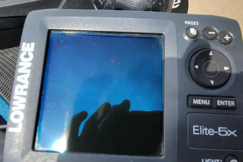 Slide: The Image of Lowrance Elite-5x fish finder on a 2000 Ranger 522DVX Comanche boat. - 21
