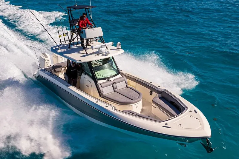 Slide: The Image of Manufacturer Provided Image: 2026 Boston Whaler 360 Outrage cruising on clear blue ocean waters. - 4