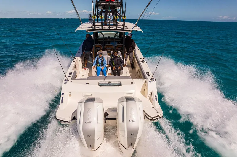 Slide: The Image of Manufacturer Provided Image: 2026 Boston Whaler 360 Outrage cruising on open water with powerful twin engines. - 7