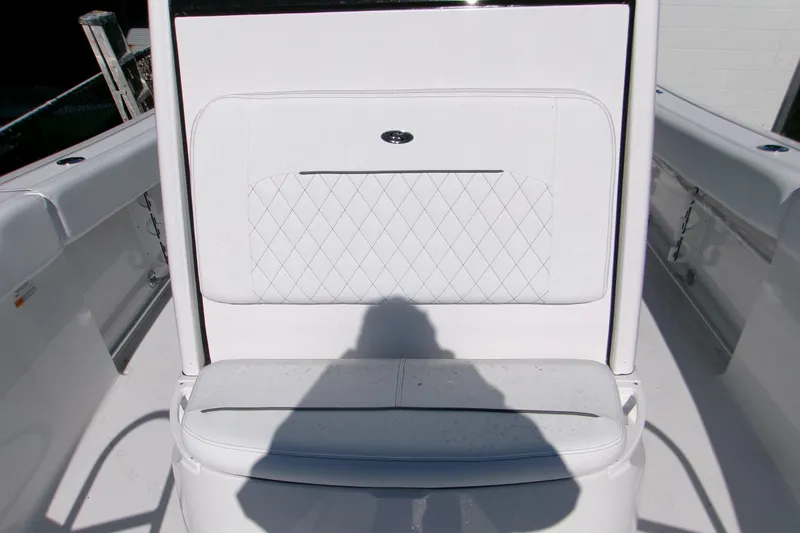 Slide: The Image of 2026 Sportsman Open 232 Center Console boat seat with diamond-pattern upholstery. - 13