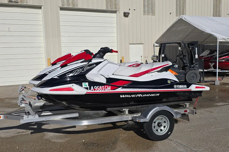Slide: The Image of 2021 Yamaha WaveRunner VX Deluxe on trailer, parked outdoors. - 7