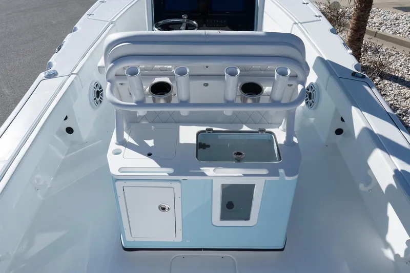 Slide: The Image of 2026 Blazer Bay Makaira 2600 boat interior with rod holders and storage compartments. - 10