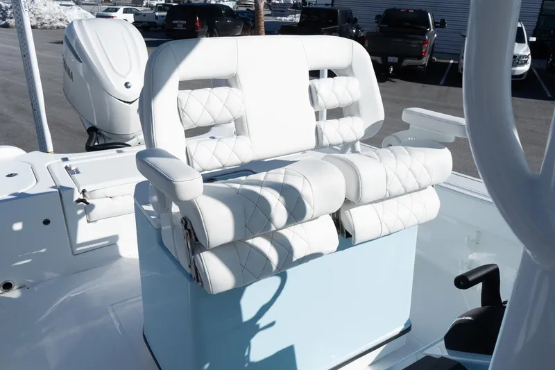 Slide: The Image of 2026 Blazer Bay Makaira 2600 boat with luxurious white seating and modern design. - 14