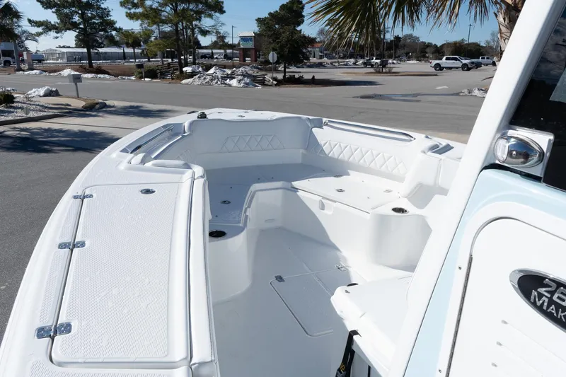 Slide: The Image of 2026 Blazer Bay Makaira 2600 boat interior with spacious seating and storage compartments. - 16