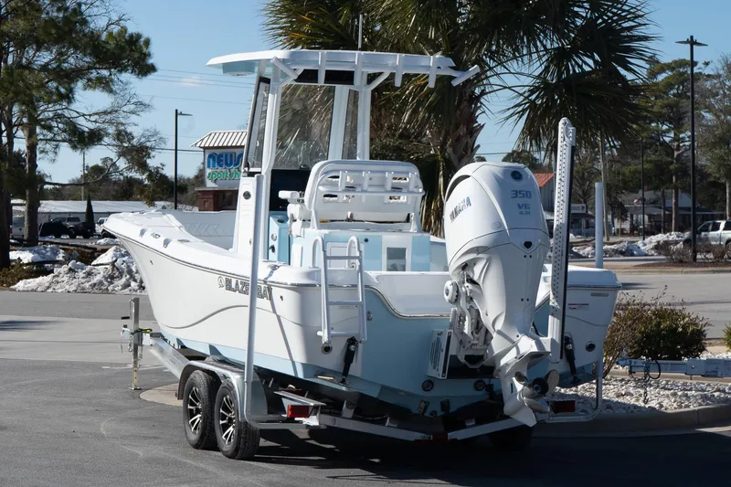Slide: The Image of 2026 Blazer Bay Makaira 2600 boat on trailer with Yamaha 350 V6 engine. - 5