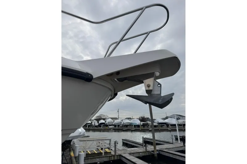Slide: The Image of 2005 Boston Whaler 255 Conquest boat anchor and bow detail at marina. - 27