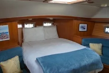 Slide: The Image of Luxurious cabin interior of 1992 Taswell 43 All Season yacht with cozy bedding. - 10